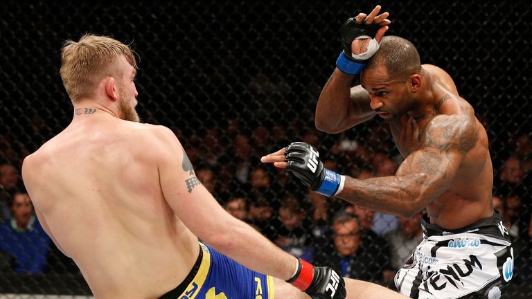 LONDON, ENGLAND - MARCH 08:  (L-R) Alexander Gustafsson kicks Jimi Manuwa in their light heavyweight fight during the UFC Fight Night London event at the O