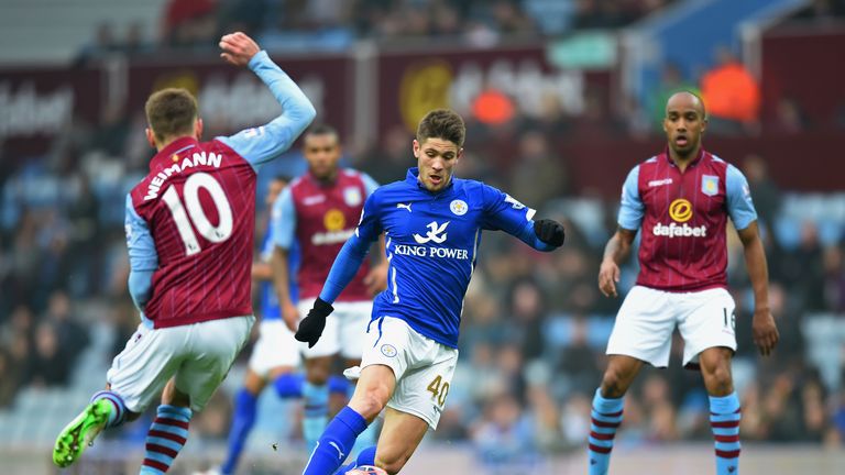 Andrej Kramaric  of Leicester City looks to go past Andreas Weimann of Aston Villa
