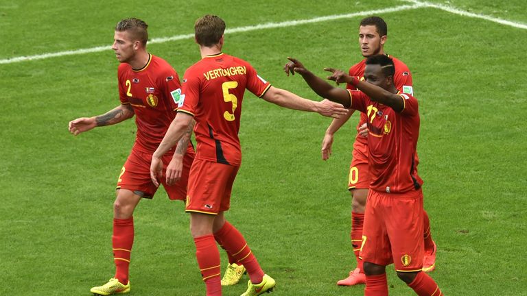 Divock Origi celebrates with team-mates Toby Alderweireld, Jan Vertonghen and Eden Hazard after  scoring for Belgium against Russia at the 2014 World Cup