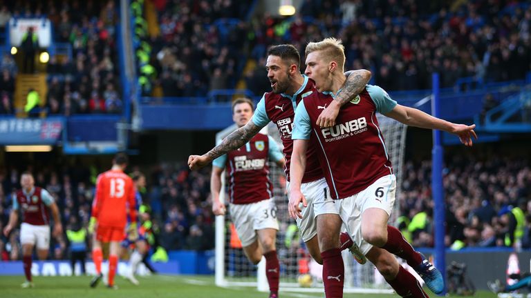 Ben Mee (R) is congratulated by team-mate Danny Ings after scoring Burnley's equaliser in the 81st minute