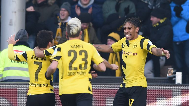Pierre Emerick Aubameyang of Borussia Dortmund celebrates his goal with team-mates during the Bundesliga match between SC Freiburg and Borussia Dortmund