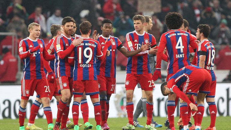 Bayern Munich's players celebrate after match VfB Stuttgart vs FC Bayern Munich in Stuttgart, southern Germany on February 7, 2015.