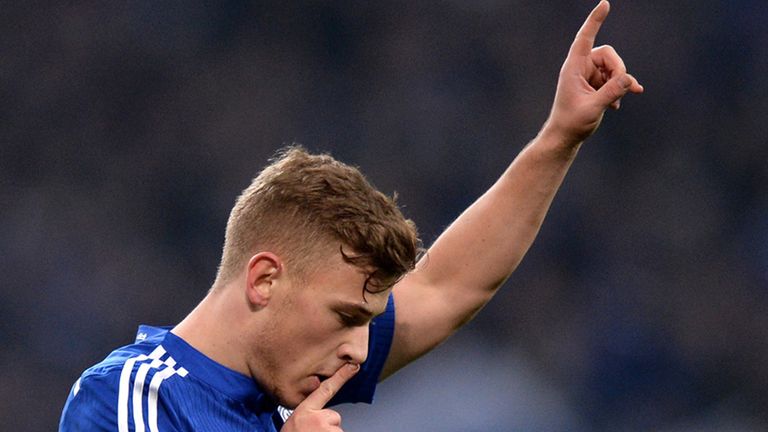 Max Meyer celebrates after scoring the opening goal d