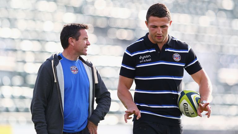 BATH, ENGLAND - OCTOBER 31:  Sam Burgess (R) the new signing for Bath Rugby in conversation with Head Coach Mike Ford (L) during a Bath training session at