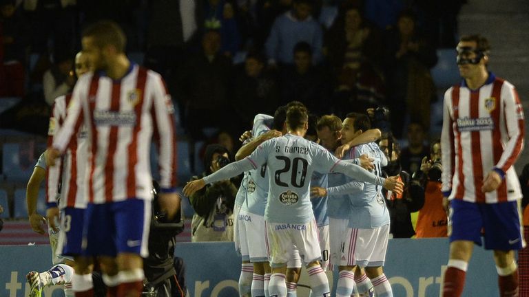 Celta de Vigo's players celebrate after scoring a goal during the Spanish league football match RC Celta de Vigo vs Club Atletico de Madrid