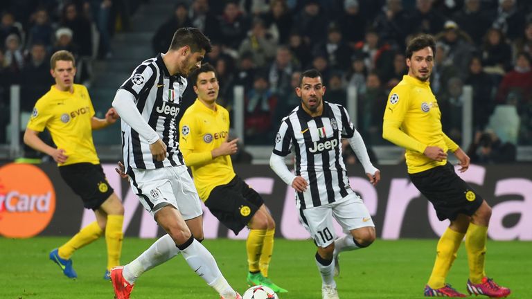 Alvaro Morata scores Juve's second goal during the UEFA Champions League Round of 16 first leg match between Juventus and Borussia Dortmund