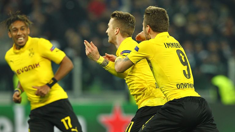 Marco Reus celebrates his goal with his team-mate Ciro Immobile during the UEFA Champions League match between Juventus and Borussia Dortmund
