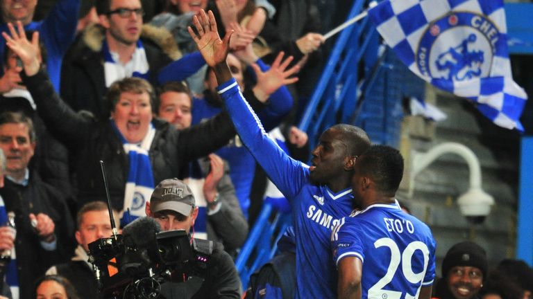 Chelsea's French-born Senegalese striker Demba Ba (L) celebrates with Chelsea's Cameroonian striker Samuel Eto'o (R) after scoring their second goal during