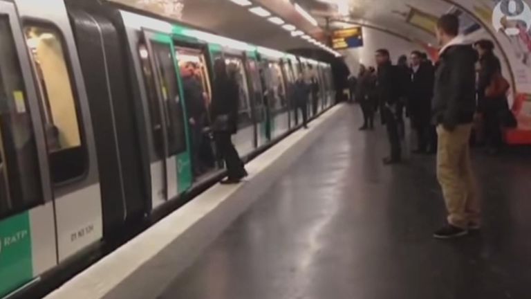 The man attempts to board the metro, but fans inside the train prevented him 