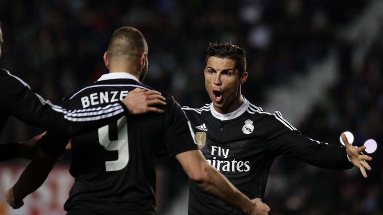 Real Madrid's Karim Benzema celebrates his goal  with Cristiano Ronaldo