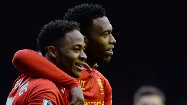 Daniel Sturridge celebrates scoring the opening goal with Liverpool team-mate Raheem Sterling during their game against Swansea in 2014