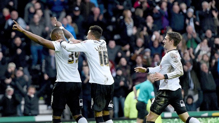 Darren Bent of Derby is congratulated after scoring during the FA Cup fifth round tie between Derby County and Reading