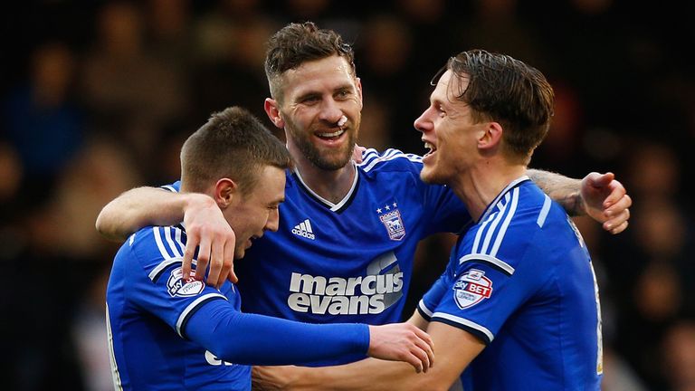 Daryl Murphy of Ipswich (C) celebrates with teammates Freddie Sears (L) and Christophe Berra (R)