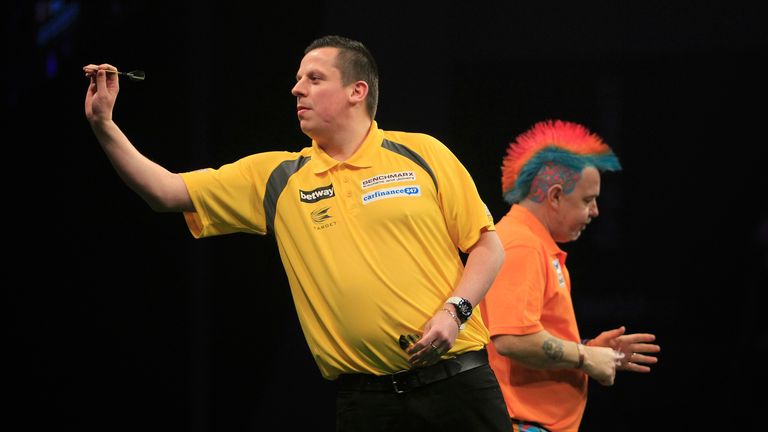 BETWAY PREMIER LEAGUE DARTS 2015.FIRST DIRECT ARENA,LEEDS.PIC;LAWRENCE LUSTIG.DAVE CHISNALL V PETER WRIGHT.DAVE CHISNALL IN ACTION