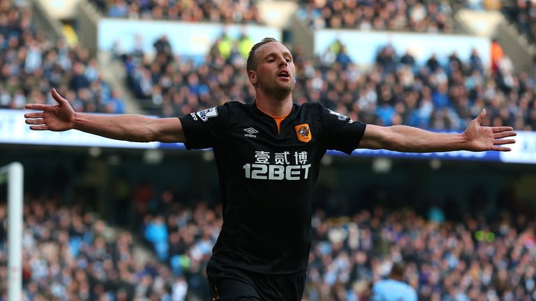 MANCHESTER, ENGLAND - FEBRUARY 07:  David Meyler of Hull City celebrates scoring the first goal during the Barclays Premier League match between Manchester