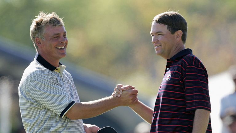 Respect: Love and Darren Clarke after their halved singles match at Oakland Hills in 2004
