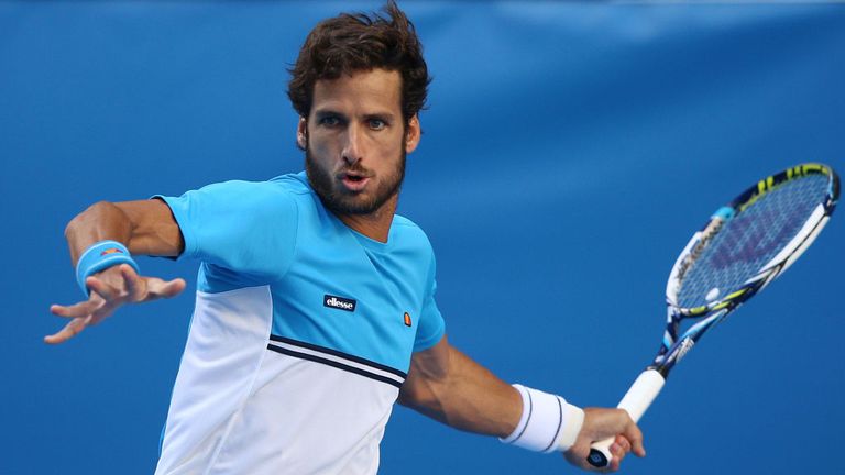 Feliciano Lopez of Spain plays a forehand in his fourth round match against Milos Raonic of Canada at the 2015 Australian Open
