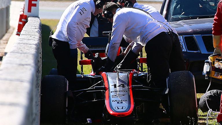 MONTMELO, SPAIN - FEBRUARY 22:  Fernando Alonso of Spain and McLaren Honda receives medical assistance after crashing during day four of Formula One Winter