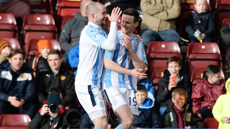Dundee's Paul McGinn (r) celebrates with James McPake after scoring against Motherwell at Fir Park