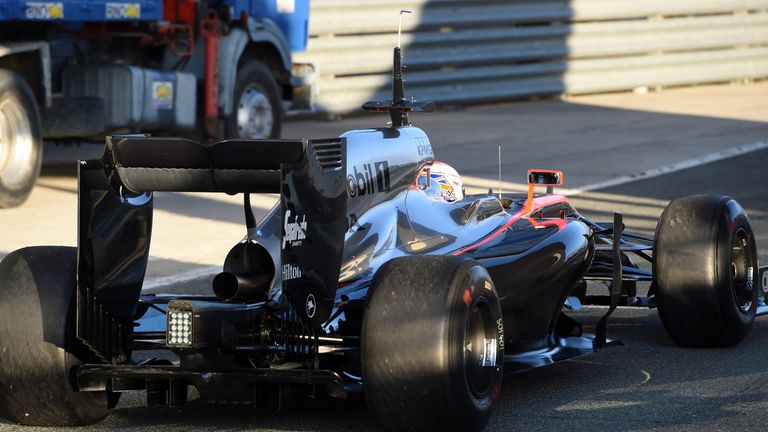 Jenson Button gets his first day in the McLaren Honda