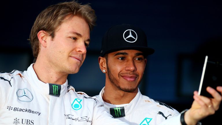 JEREZ DE LA FRONTERA, SPAIN - FEBRUARY 01:  Lewis Hamilton of Great Britain and Mercedes GP and Nico Rosberg of Germany and Mercedes GP pose with the new W