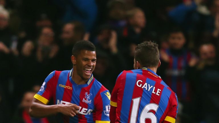 Fraizer Campbell celebrates scoring the opening goal with Dwight Gayle during the FA Cup fifth round match between Crystal Palace and Liverpool