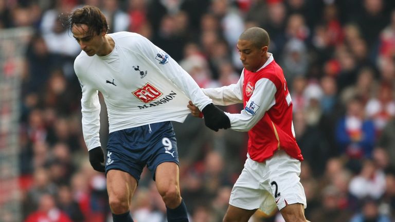 Gael Clichy of Arsenal pulls the shirt of Dimitar Berbatov of Tottenham Hotspur during the Barclays Premier League match in December 2007