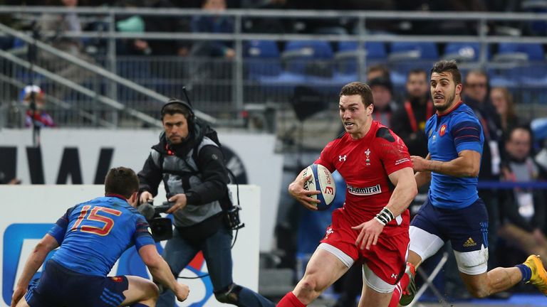 George North of Wales runs at Eddy Ben Arous (L) of France during the RBS Six Nations match between France and Wales