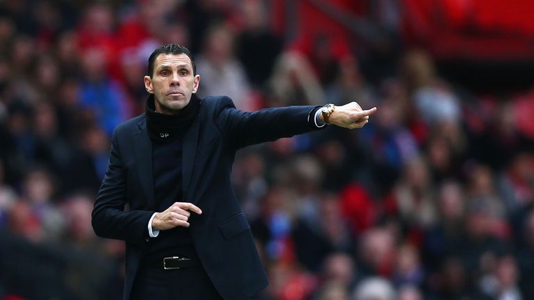 MANCHESTER, ENGLAND - FEBRUARY 28:  Manager Gustavo Poyet of Sunderland gives instructions during the Barclays Premier League match between Manchester Unit
