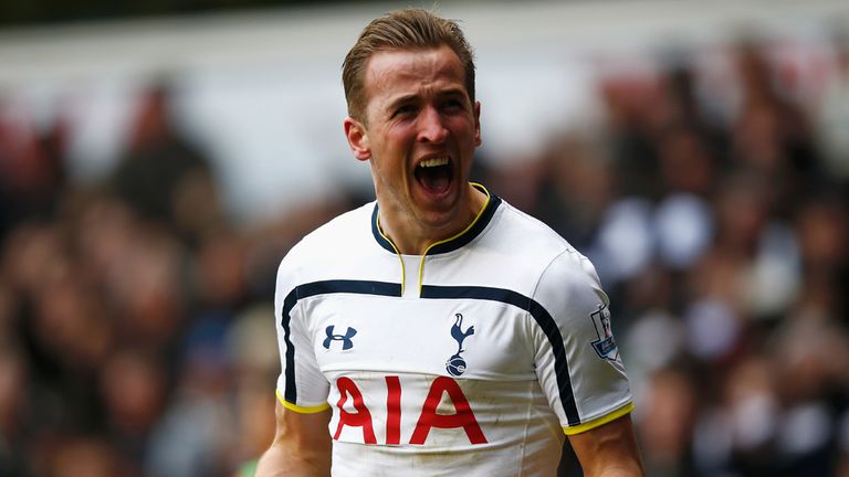 Harry Kane celebrates after equalising for Tottenham against Arsenal