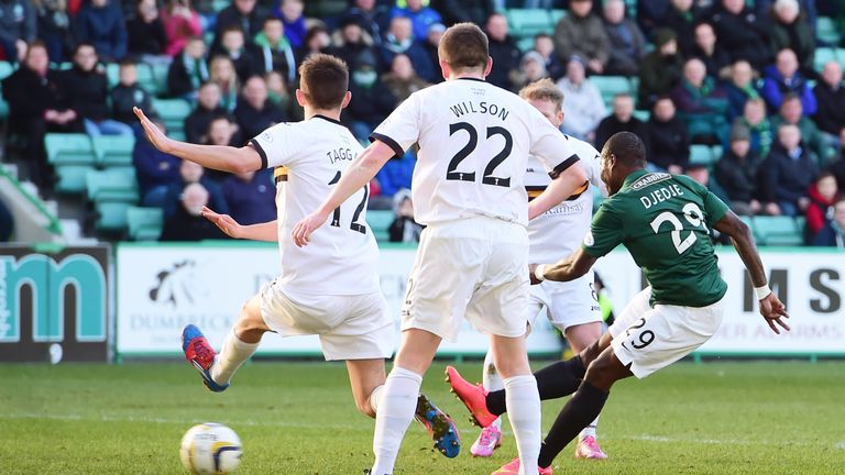 Hibernian's Franck Dja Djedje (right) opens the scoring for the home side