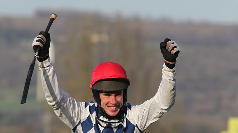 Jockey Derek O'Connor celebrates winning the Christie's Foxhunter Chase Challenge Cup on Zemsky during Gold Cup Day, at the 201 1 Cheltenham Festival.
