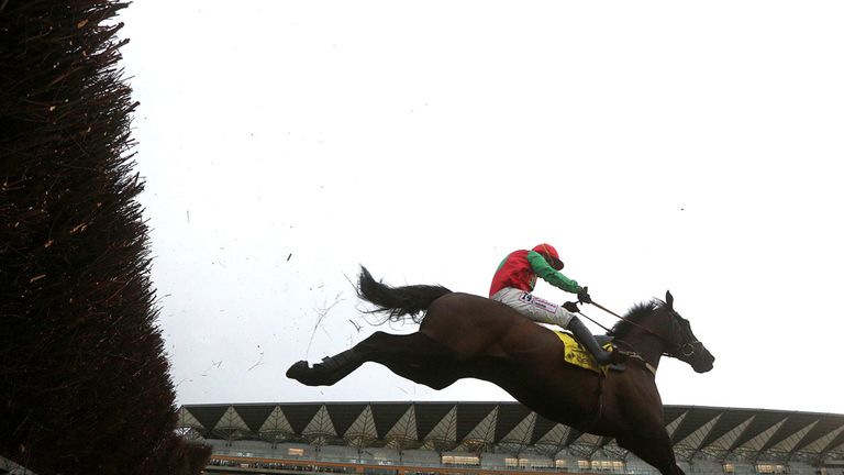Wayne Hutchinson and Balder Succes fly the final fence on their way to victory in the Betfair Ascot Chase.
