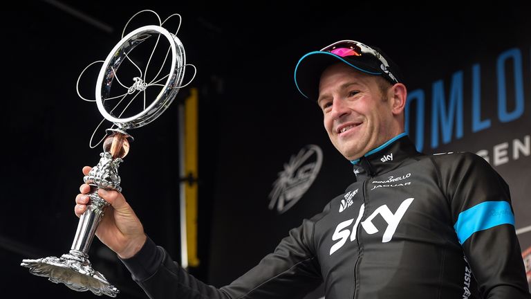 British Ian Stannard of Team Sky celebrates on the podium after the 'Omloop Het Nieuwsblad', the first cycling race of the season in Belgium,