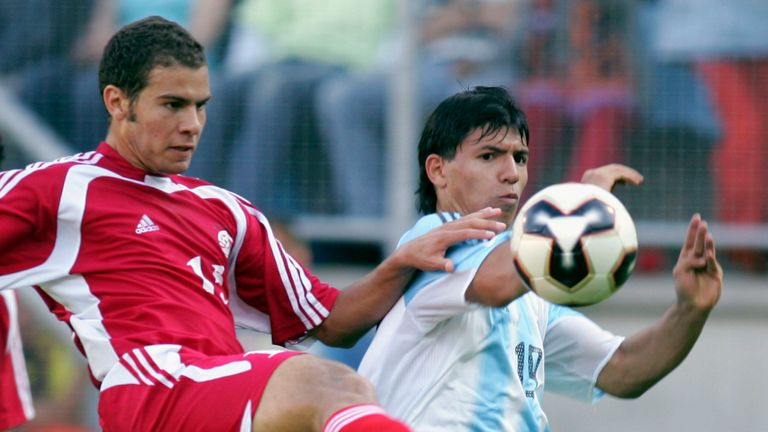Islam Siam of Egypt is challenged by Sergio Aguero of Argentina during the FIFA World Youth Championship match between Egypt and Argentina on June 14, 2005