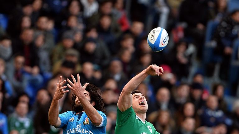 Tommy Bowe tipped the ball away from Luke McLean as the pair did battle in the air