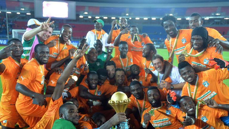 Ivory Coast's players celebrate with the trophy at the end of the 2015 African Cup of Nations final