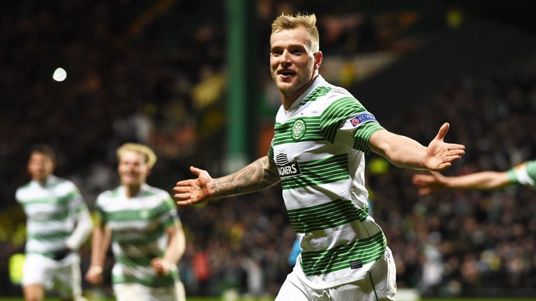 Celtic's John Guidetti celebrates after scoring his side's third goal