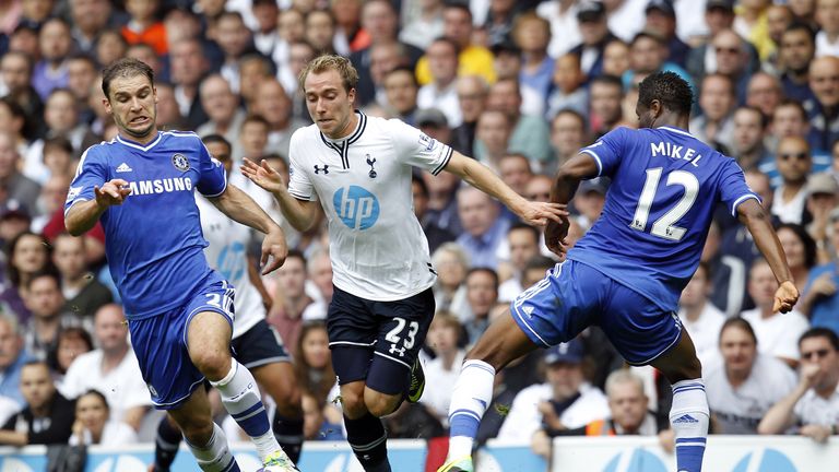 Tottenham Hotspur's Christian Eriksen vies with Chelsea's Branislav Ivanovic (L) and John Obi Mikel, September 2013