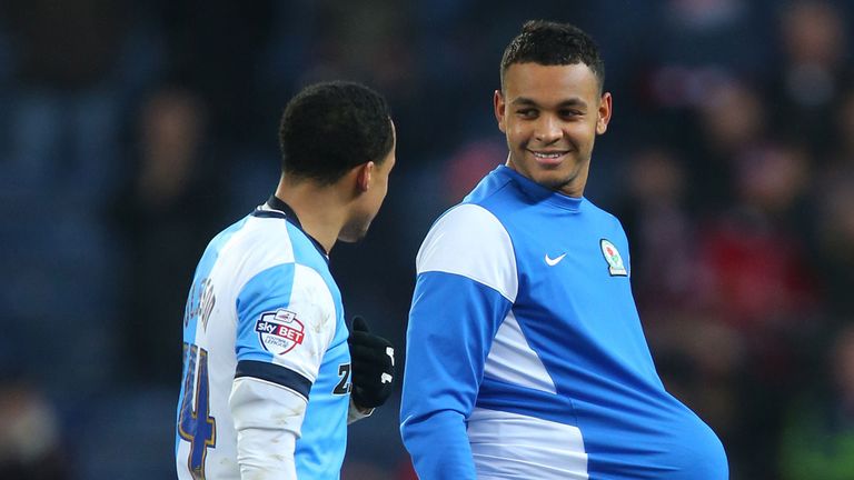 Blackburn Rovers' Joshua King leaves the pitch with the match ball after scoring a hat-trick against Stoke