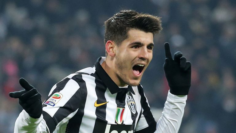 Juventus forward Alvaro Morata celebrates after scoring against Milan