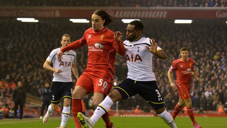 Tottenham Hotspur's Danny Rose (R) cuts across to try to tackle Liverpool's Lazar Markovic 