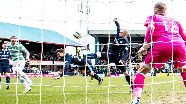 Celtic striker Leigh Griffiths scores the opening goal against Dundee