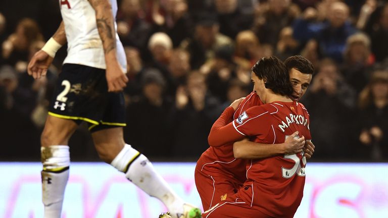 Liverpool's Lazar Markovic celebrates after scoring the opening goal against Tottenham 