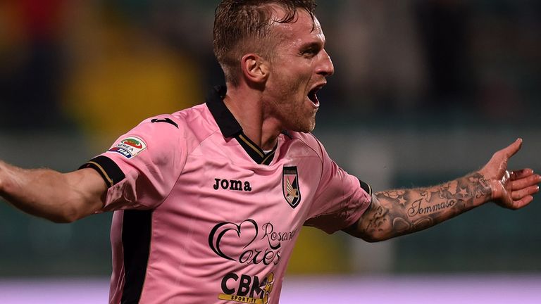 Luca Rigoni of Palermo celebrates after scoring his team's third goal against Napoli