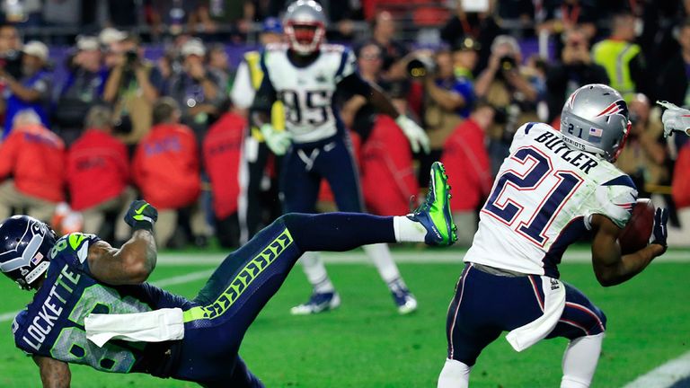 GLENDALE, AZ - FEBRUARY 01:  Malcolm Butler #21 of the New England Patriots intercepts a pass by  Russell Wilson #3 of the Seattle Seahawks intended for  R