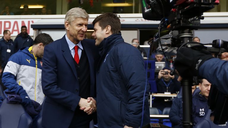 Arsenal manager Arsene Wenger shakes hands with Tottenham's head coach Mauricio Pochettino