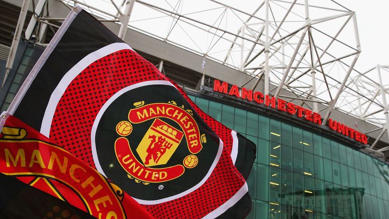 A Manchester United flag flies ahead of the Barclays Premier League match between Manchester United and Sunderland at Old Trafford