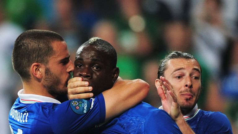 Leonardo Bonucci of Italy covers Mario Balotelli's mouth after he scores his side's second goal against Ireland at UEFA EURO 2012