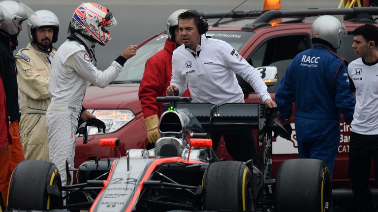 Jenson Button (GBR) McLaren MP4-30 stops on track 